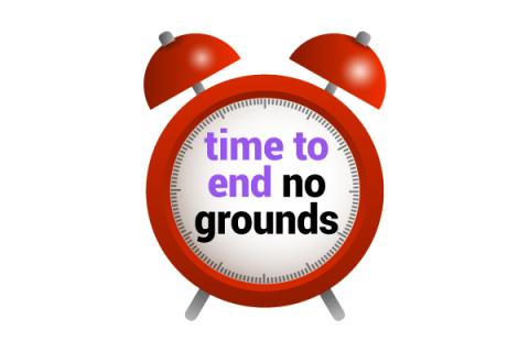 Alarm clock with 'time to end no grounds' written on clock face
