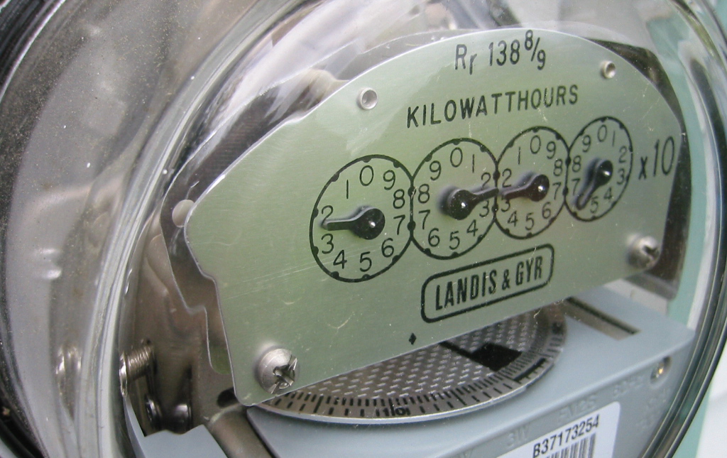 Electricity meter with 4 dials
