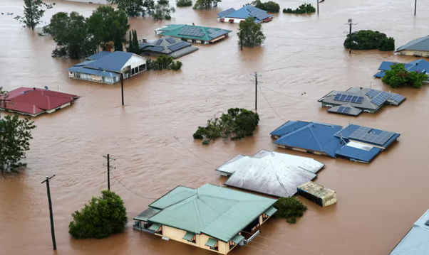 Houses under brown water due to floods, Lismore 2022
