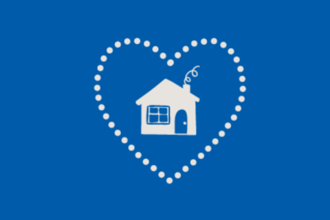 Illustration of a house in a heart in relief, blue background